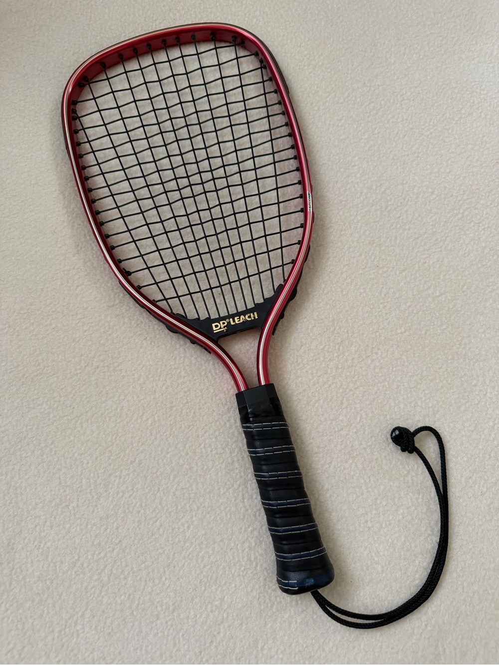 Red Squash/Racquetball Racket with Black Grip - Recreational Outdoor Game